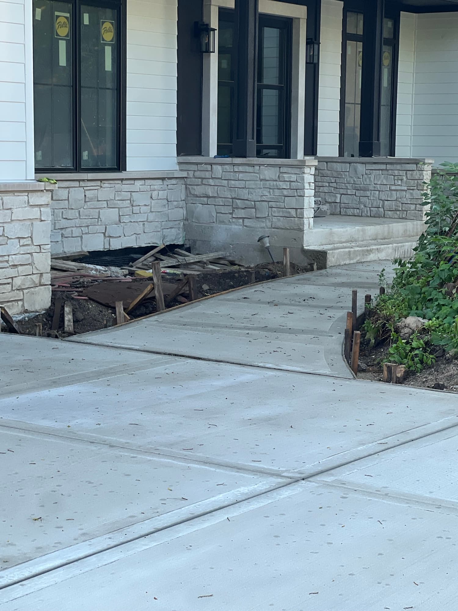 Concrete front walkway stone porch