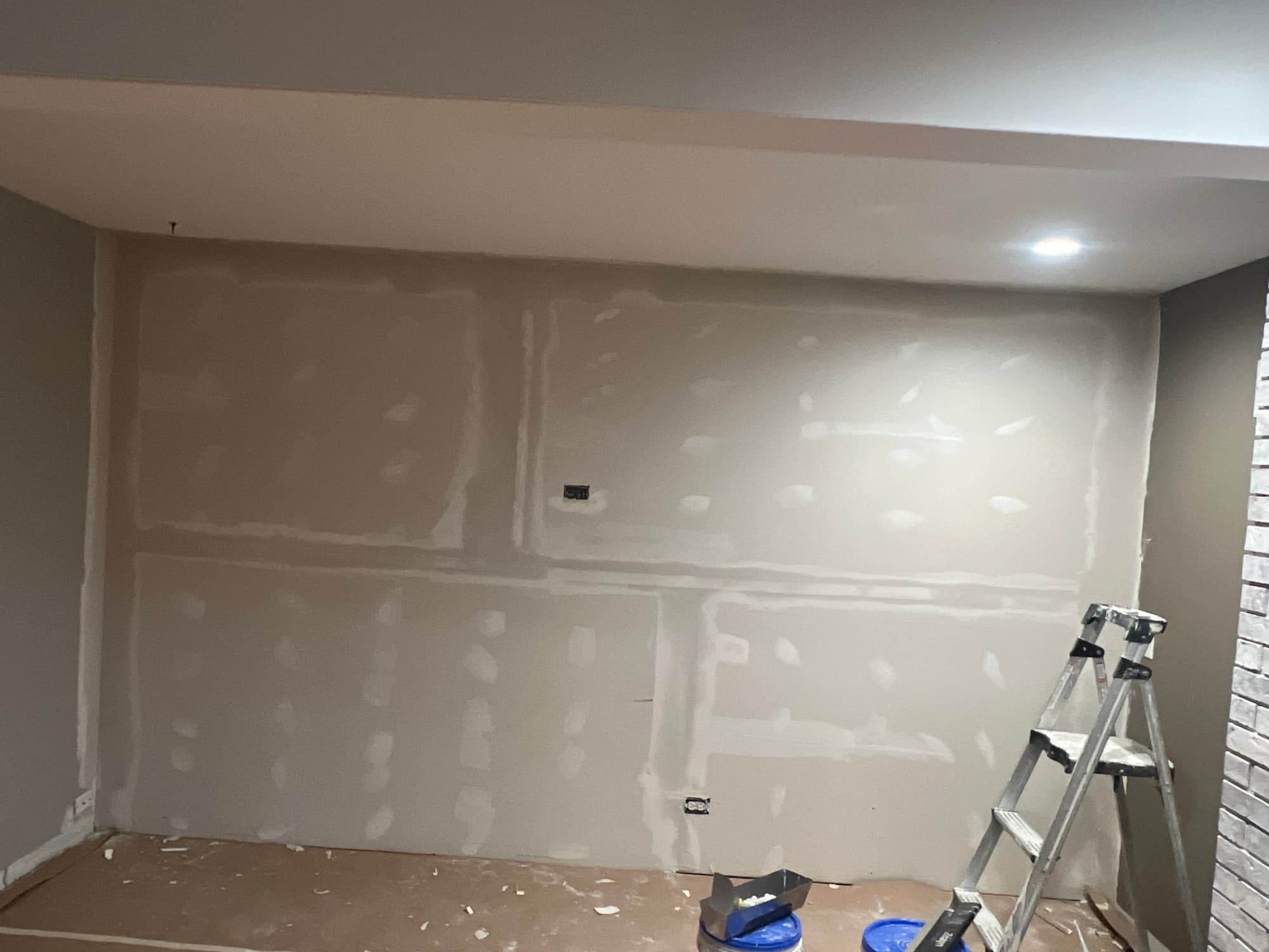 Basement wall drywall taping