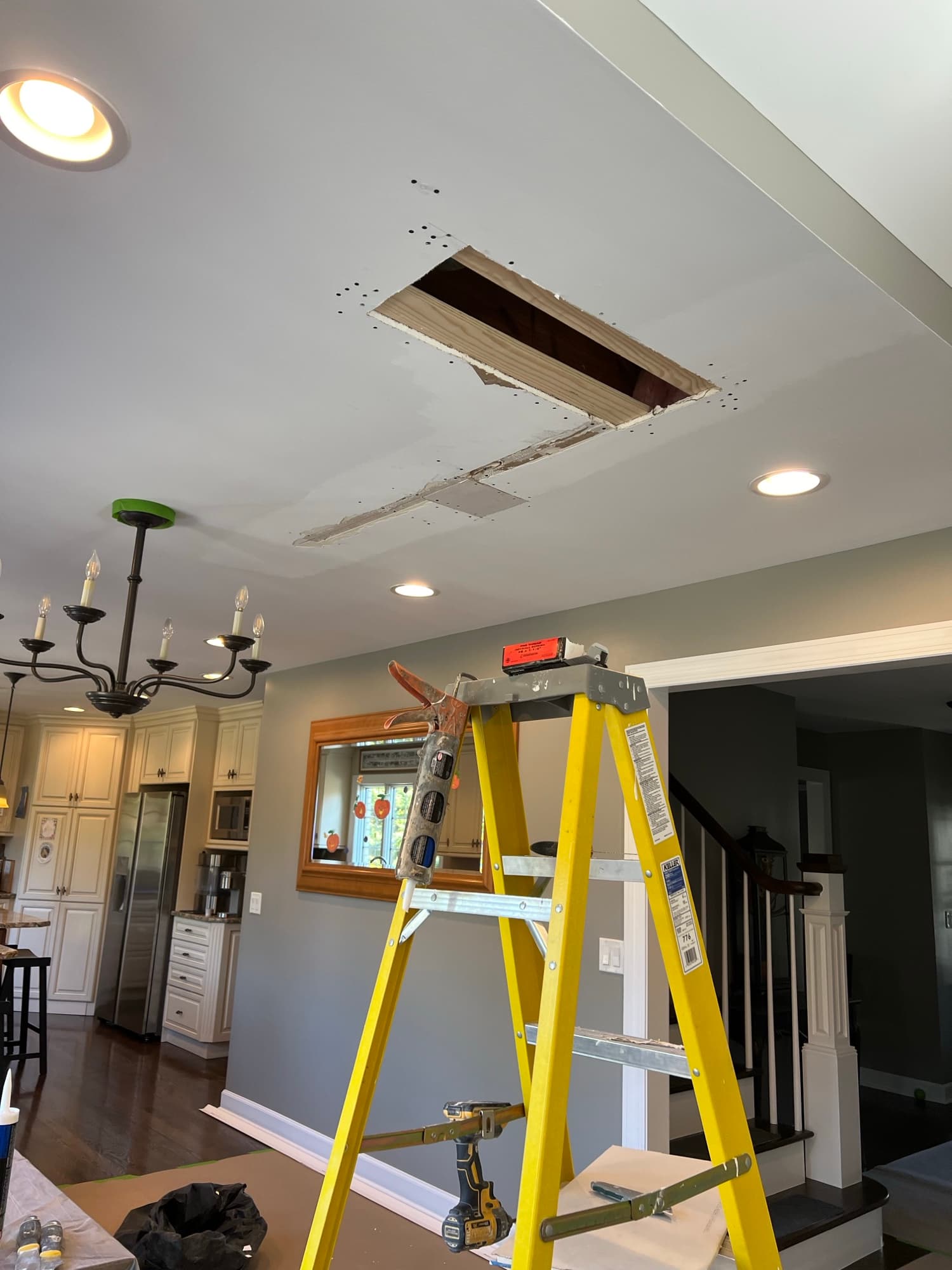 Ceiling drywall repair opening
