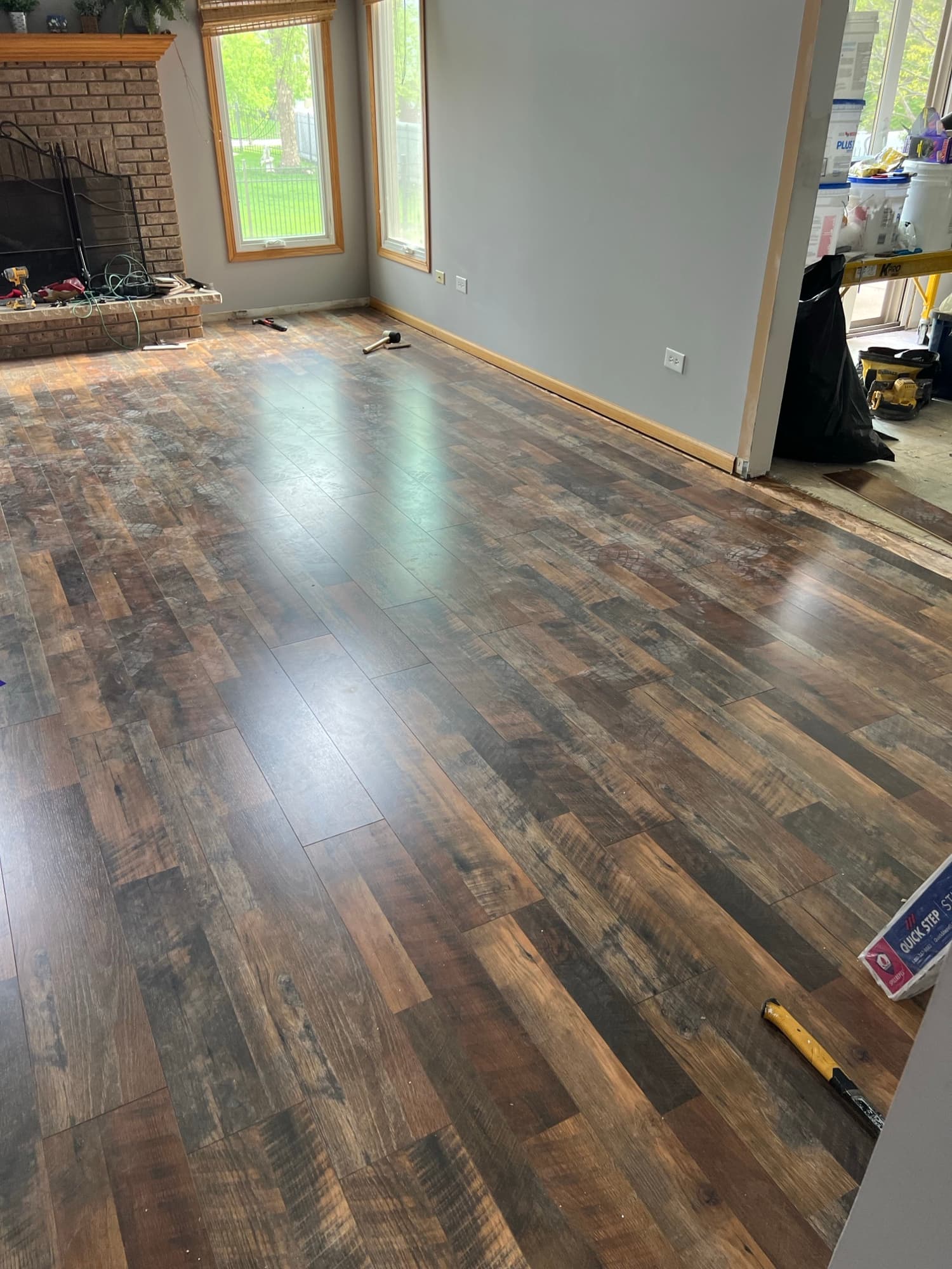 Rustic plank flooring living room